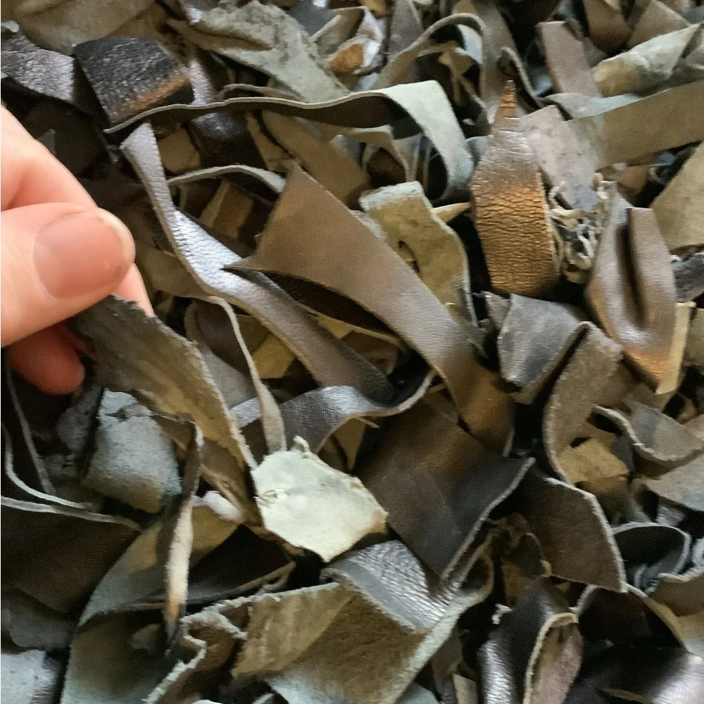 Leather scraps rug 20” by 37 1/2”